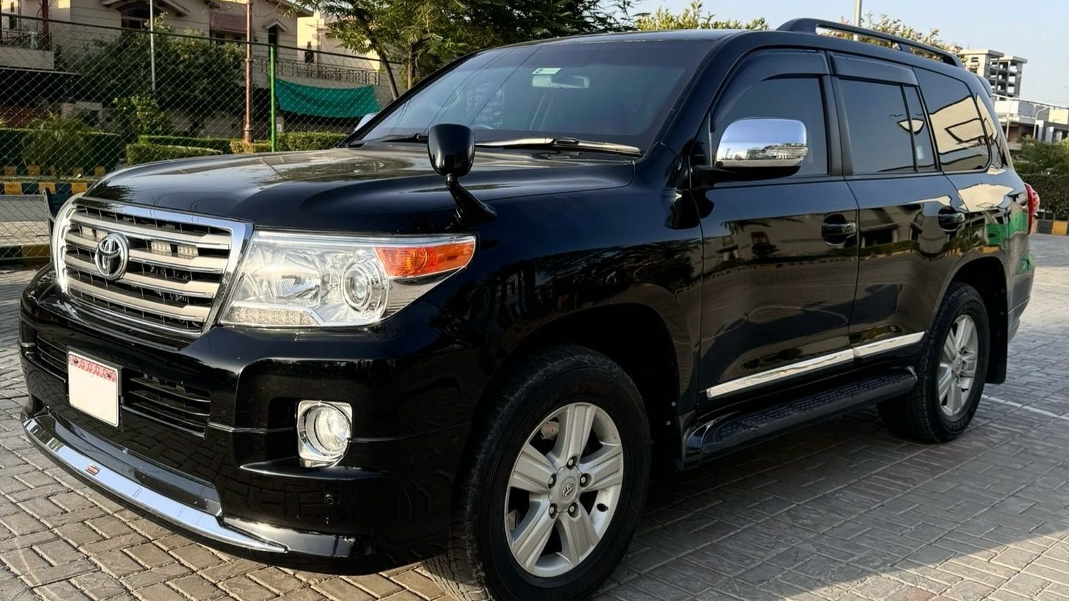 Black Toyota Land Cruiser V8 rent a car with driver in Pakistan