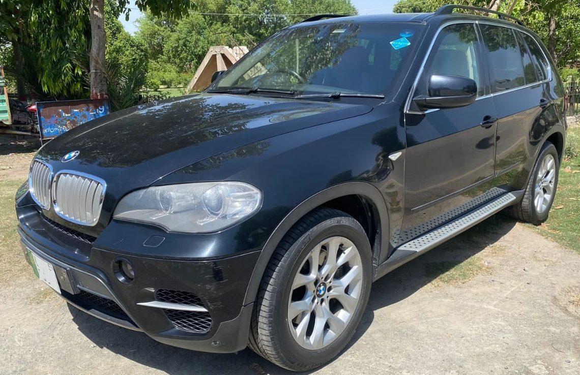 Armored BMW X5 for rent in Lahore - black front side