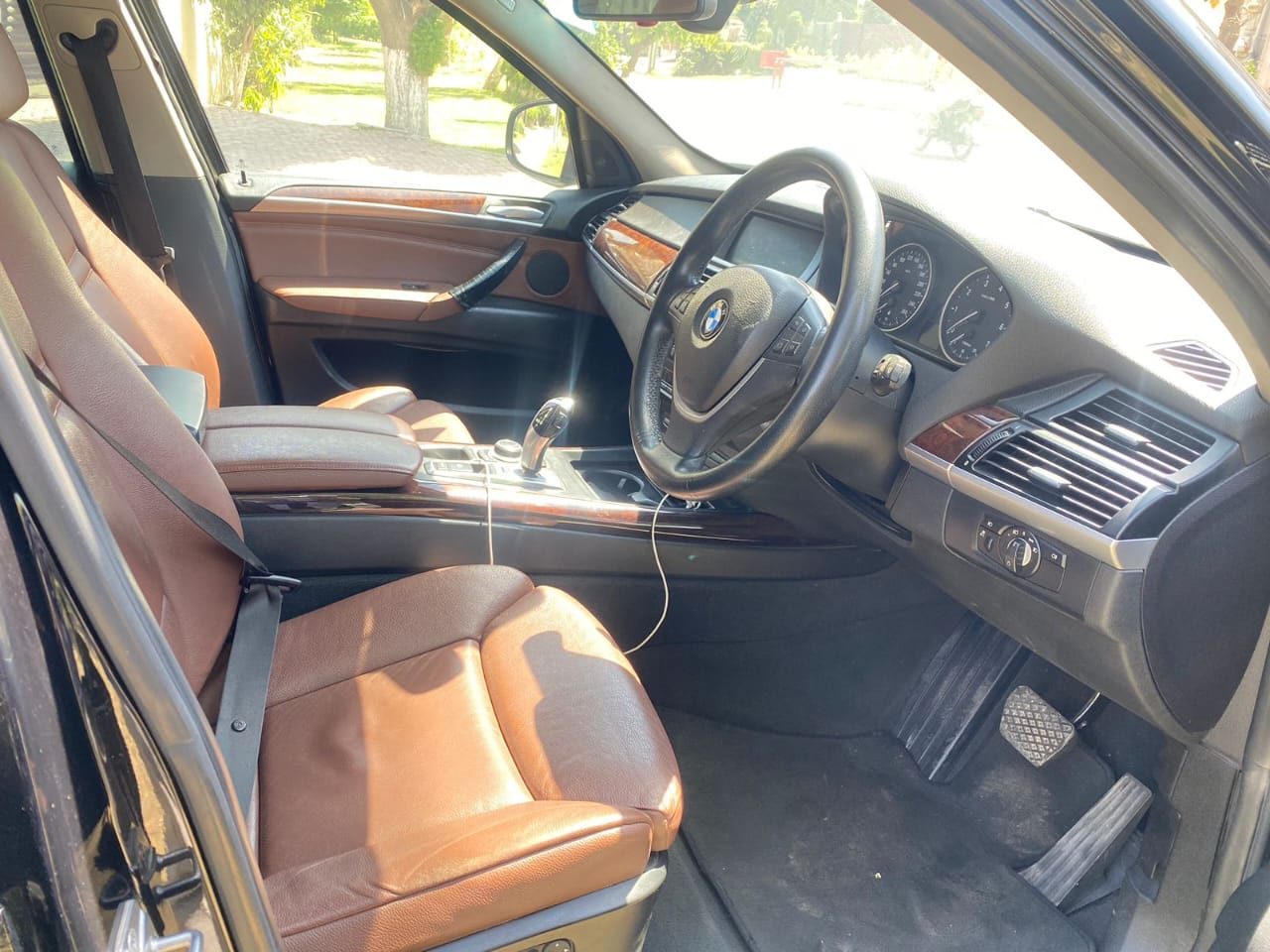 Armored BMW X5 for rent in Lahore - front cabin