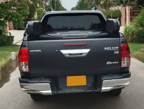 Armored Toyota Hilux Revo Rocco Vigo for rent in Karachi - black rear tailgate