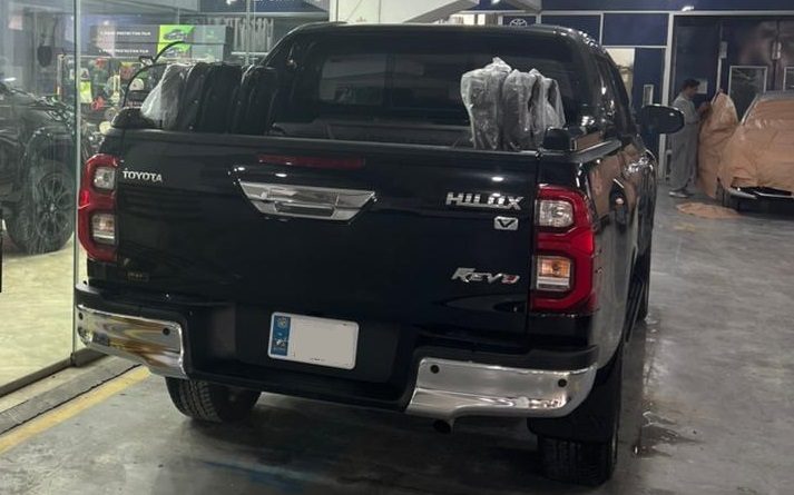 Armored Toyota Hilux Revo Rocco Vigo for rent in Karachi - black rear workshop