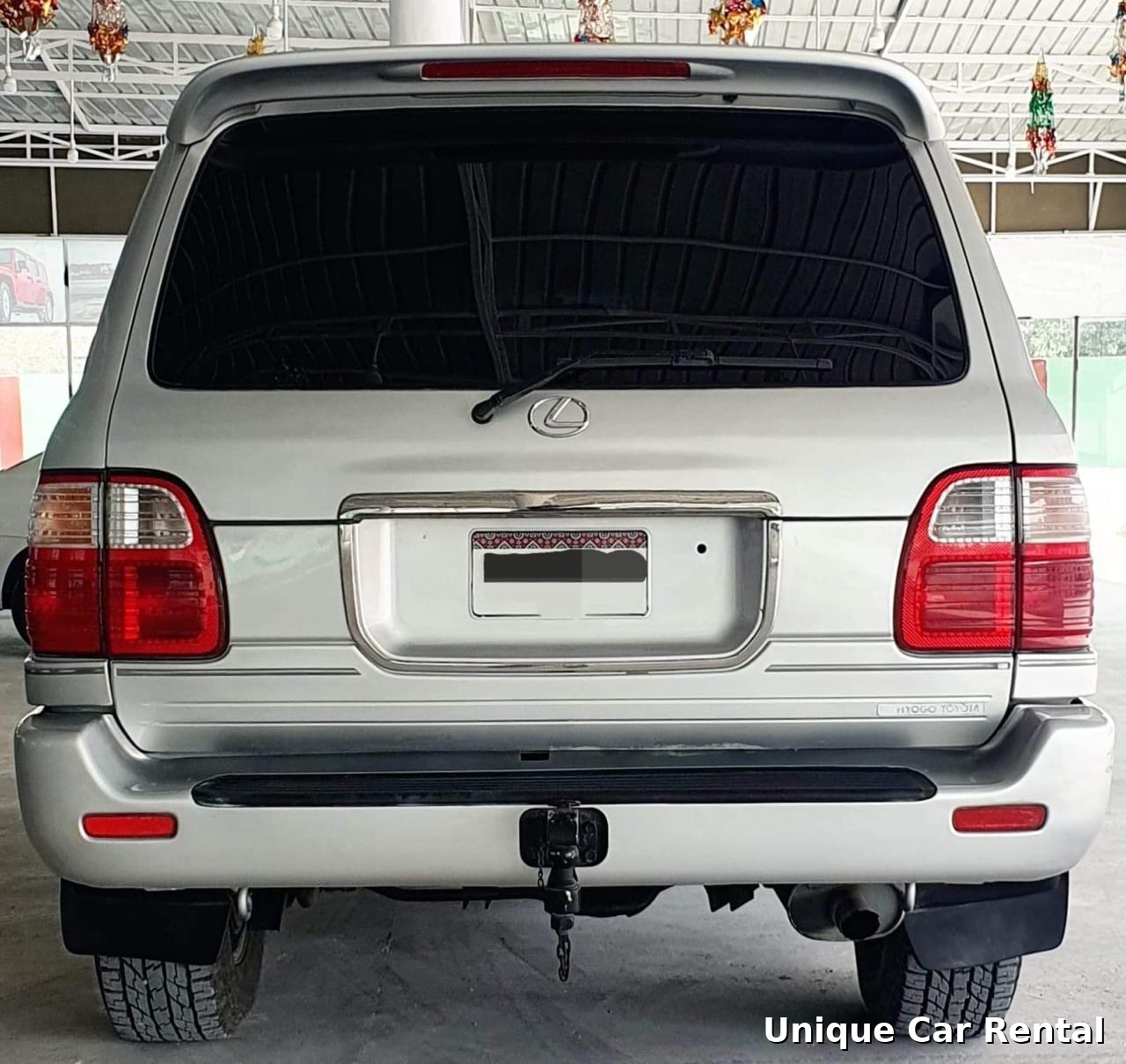 Bulletproof Toyota Cygnus silver rear view in Karachi