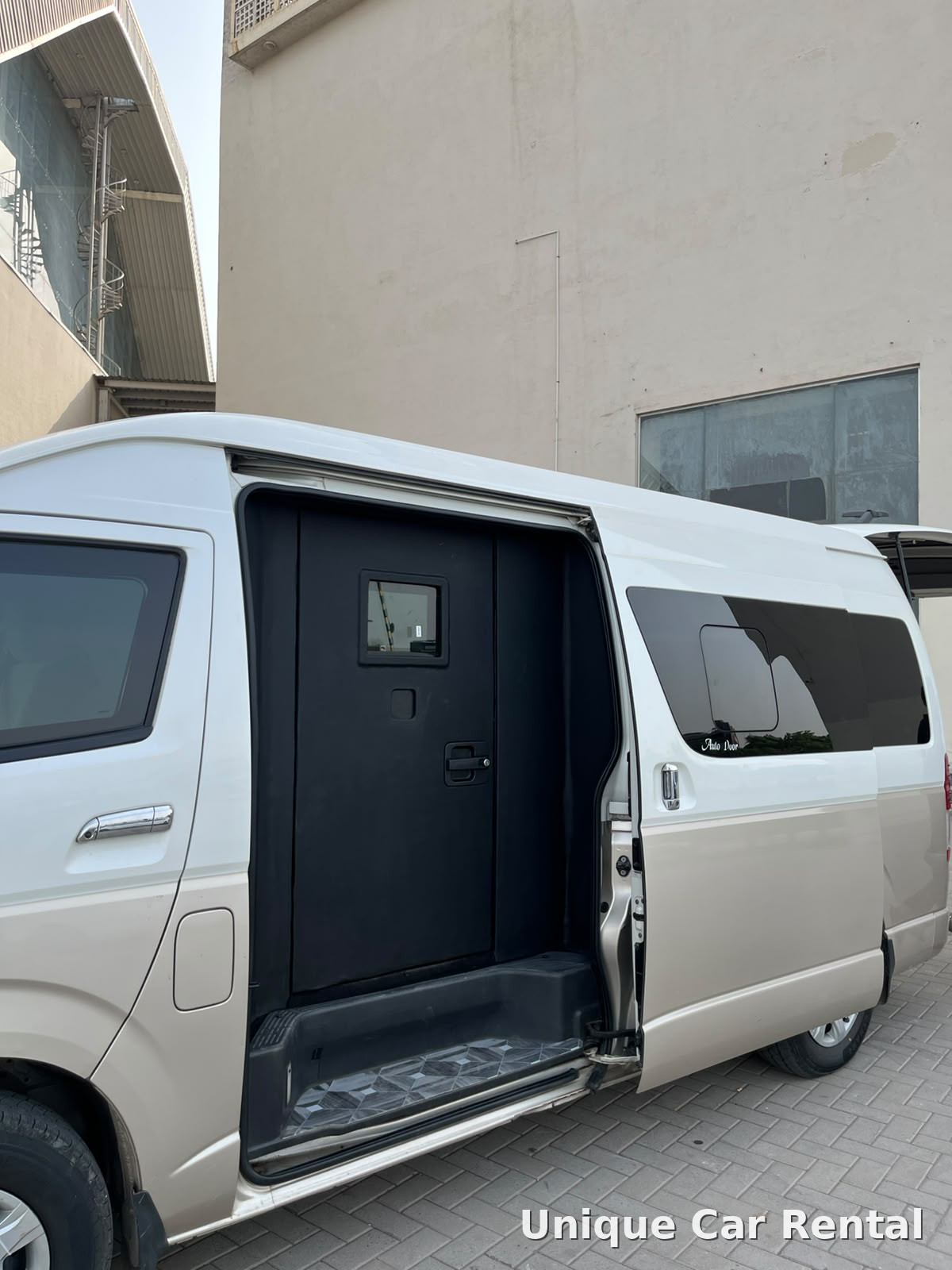 Armored Toyota Hiace van with open ballistic side door