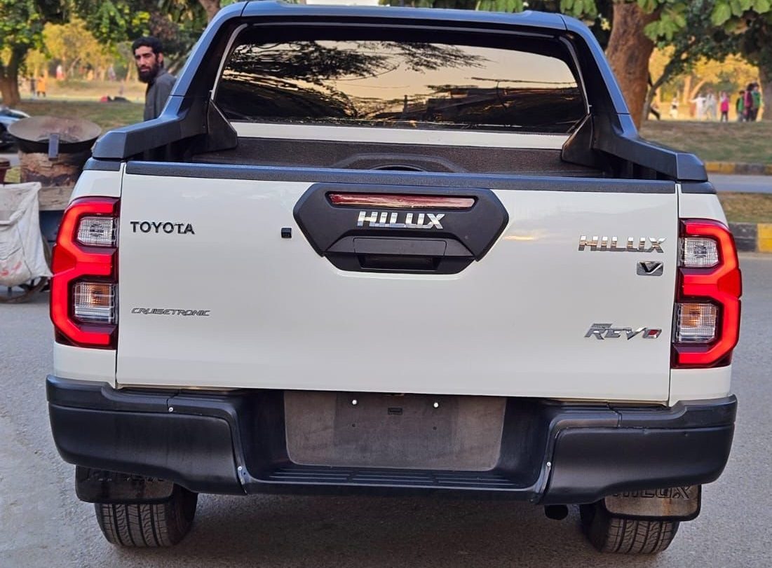 Bulletproof Toyota Hilux Revo for rent in Lahore - white rear tailgate