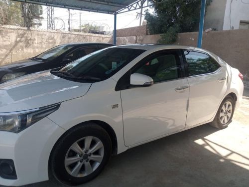 Toyota Corolla for rent in Islamabad - white side