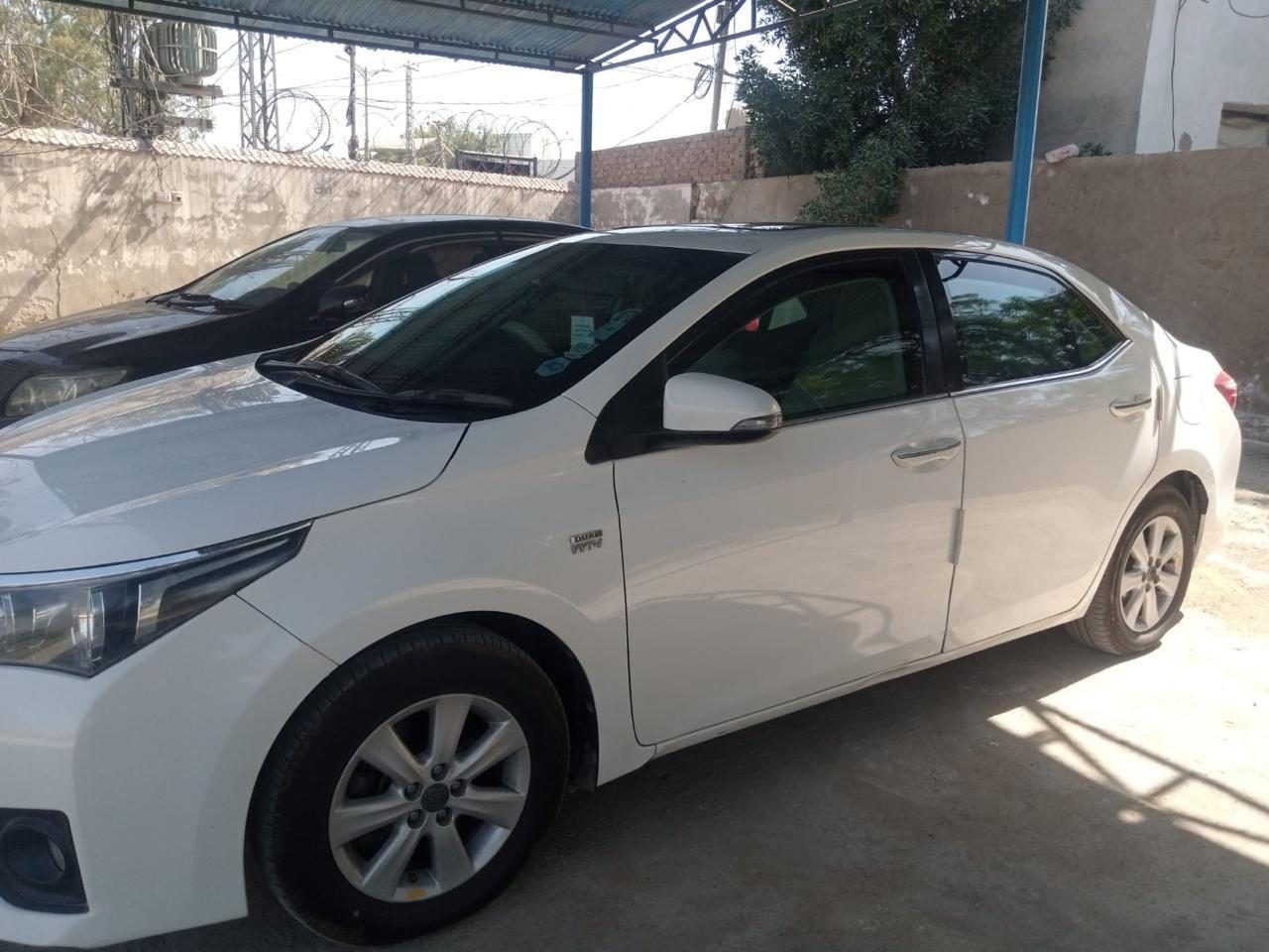 Toyota Corolla for rent in Islamabad - white side