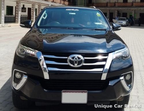 Black Toyota Fortuner front view