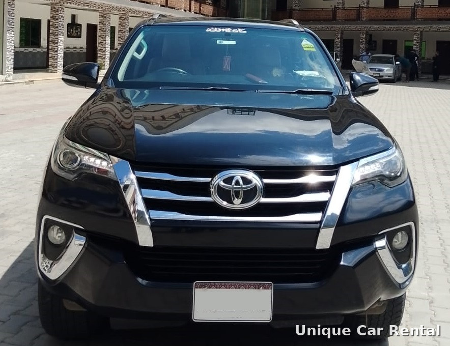 Black Toyota Fortuner front view