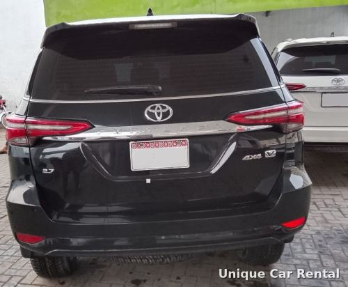 Black Toyota Fortuner rear view