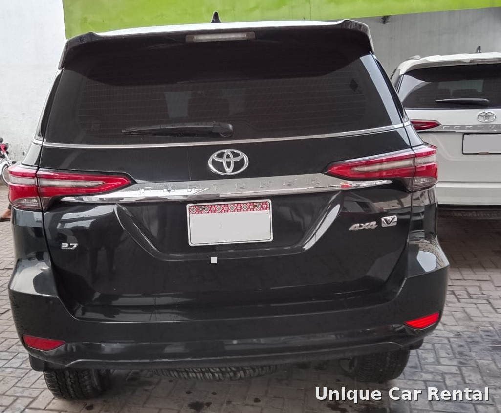 Black Toyota Fortuner rear view