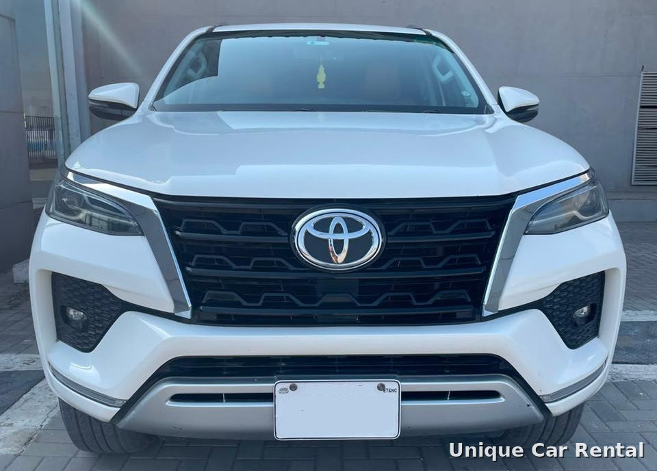 White Toyota Fortuner front grille close-up