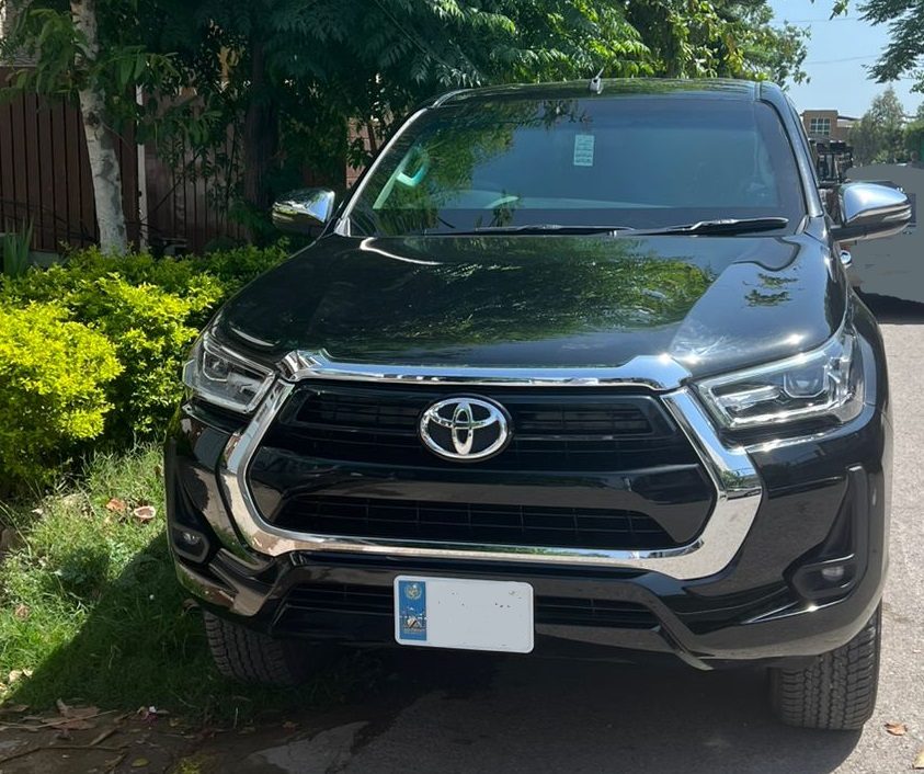 Toyota Hilux Revo for rent in Lahore - black front