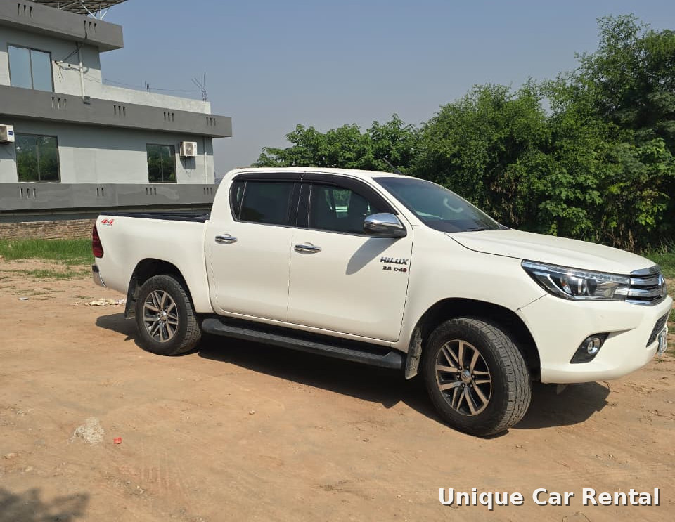 White Toyota Hilux Revo double cabin pickup