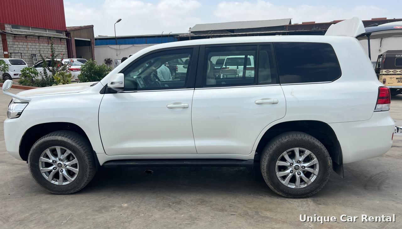 White Toyota Land Cruiser 200 SUV side view