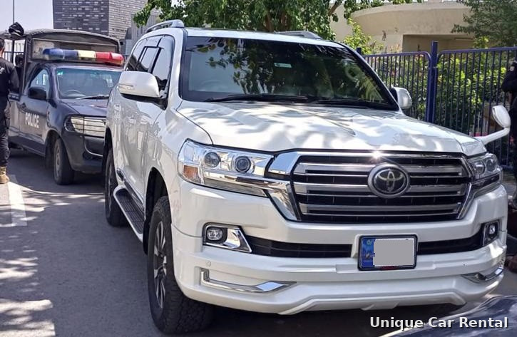 White Toyota Land Cruiser 200 with police escort - full security VIP movement in Islamabad