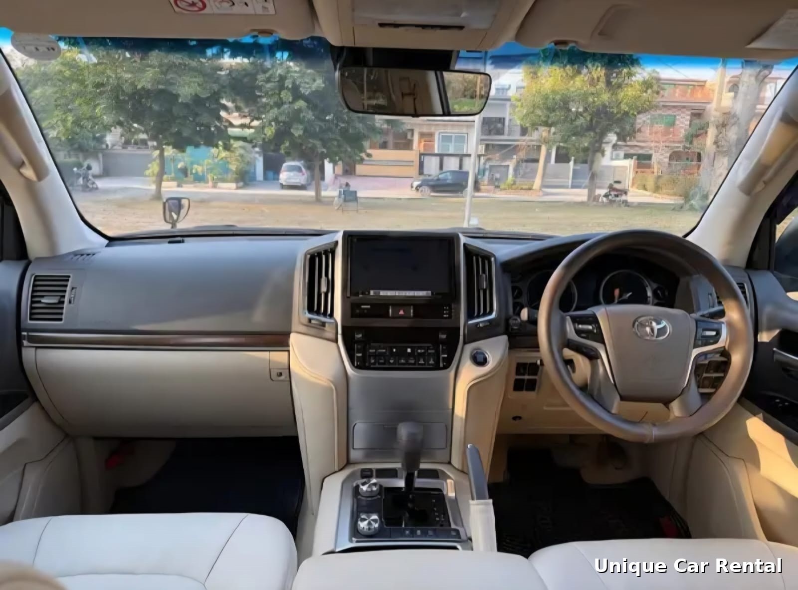 Toyota Land Cruiser V8 beige leather dashboard interior in Islamabad