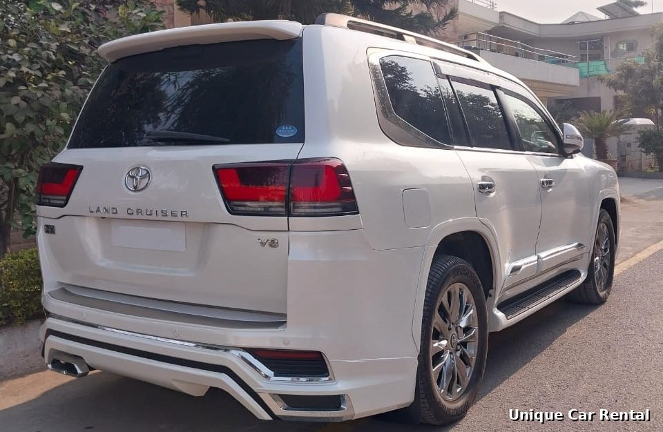 Toyota Land Cruiser V8 white rear three-quarter view for rent in Islamabad