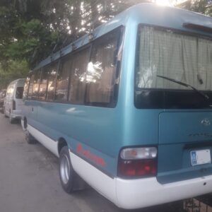 Toyota Coaster available for rent in Lahore for local and out-of-city trip