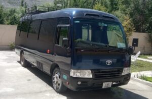 Coaster rental for corporate events in Lahore with professional services