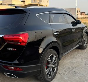 Glory SUV night shot under city lights