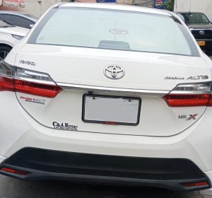 Toyota Corolla Grande 1.8 front view for rent in Lahore