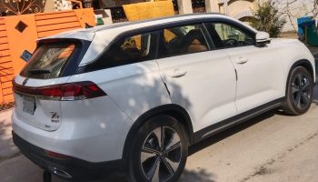 Oshan X7 luxury SUV side profile for rent in Lahore