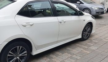 Toyota Corolla Altis 1.6 – Silver with driver in Lahore Toyota Corolla Altis 1.8 White available for rent with driver in Lahore